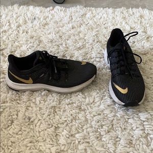 Black and Gold Nike Running Shoes
